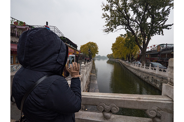 taking photos in Hou Hai Lake Beijing China
