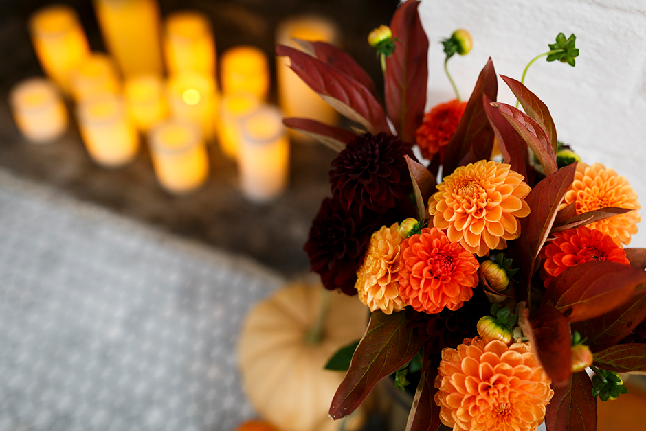 Autumn decorations candles and flowers